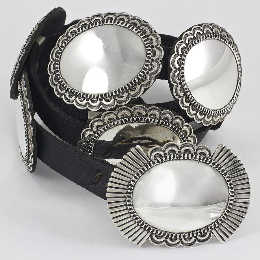 A Cadman Black Leather and Polished Sterling Silver Concho Belt