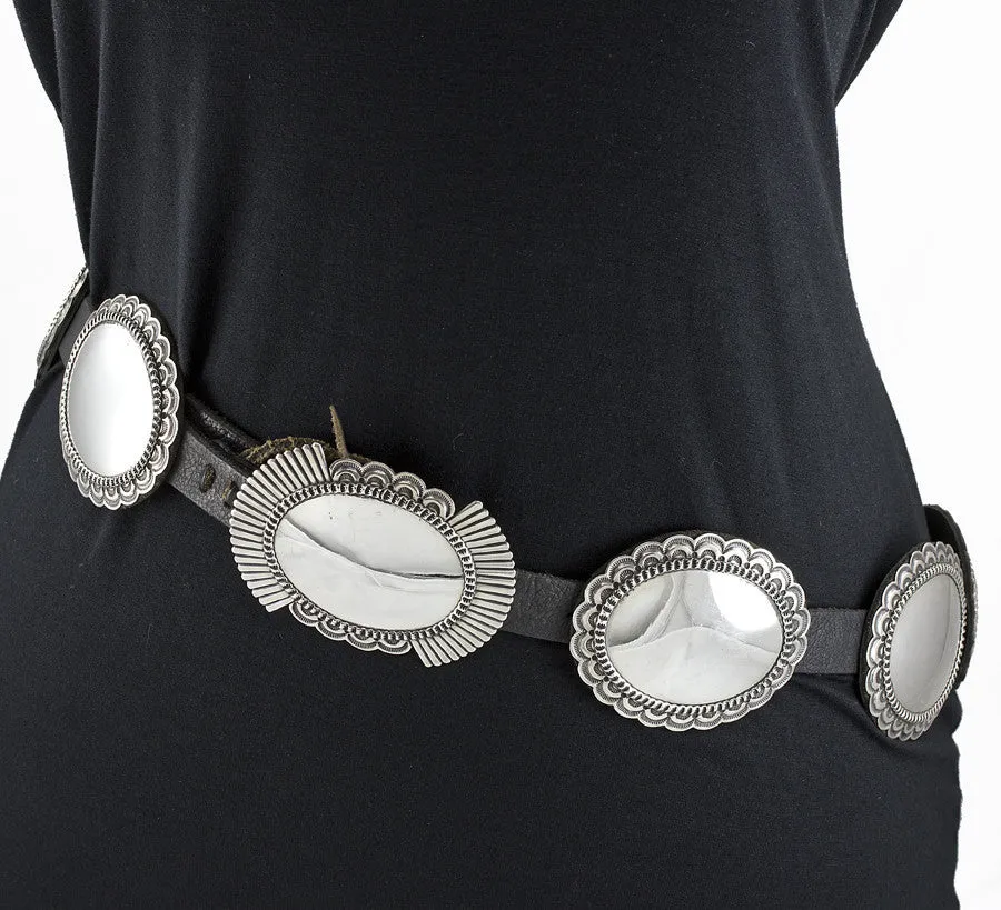 A Cadman Black Leather and Polished Sterling Silver Concho Belt